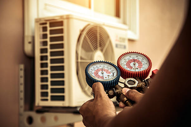 Professional Heat Pump Repair technician working in San Fernando, CA